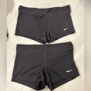 Nike. Women’s medium, black spandex(x2).